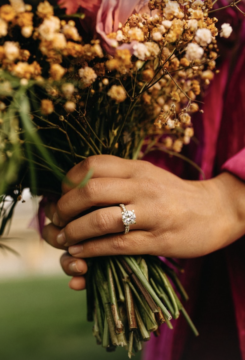 Brilliant cut diamond engagement ring