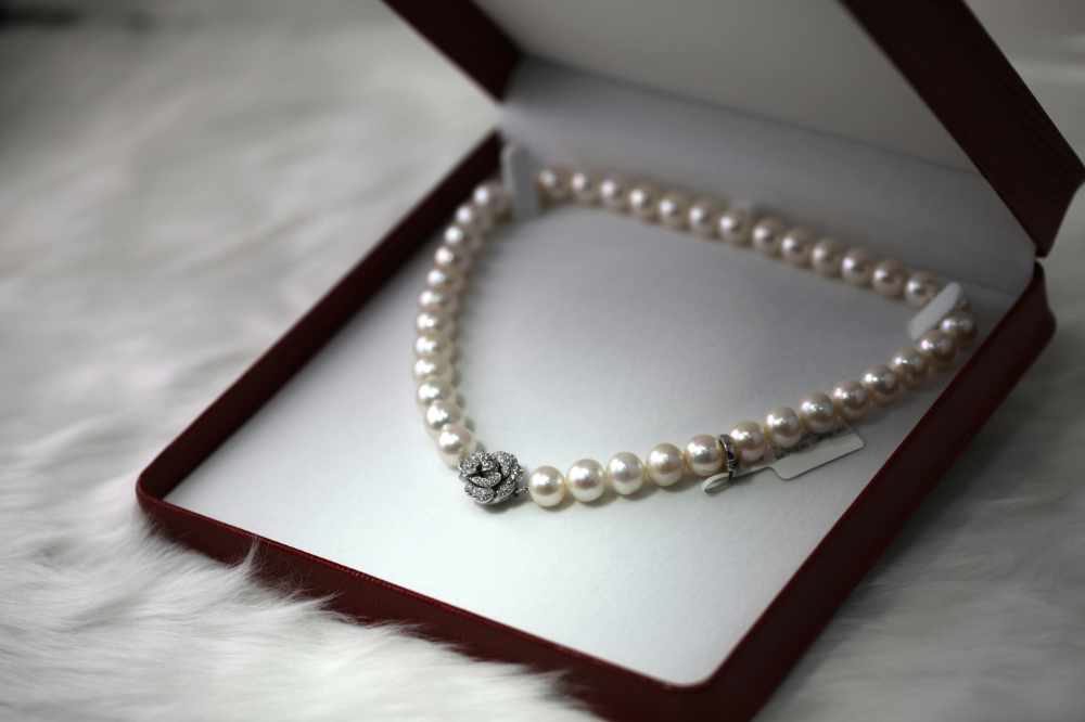 How to Style Pearls for Every Occasion A collection of elegant pearl jewelry including necklaces, earrings, and bracelets, styled for different occasions from casual to formal.